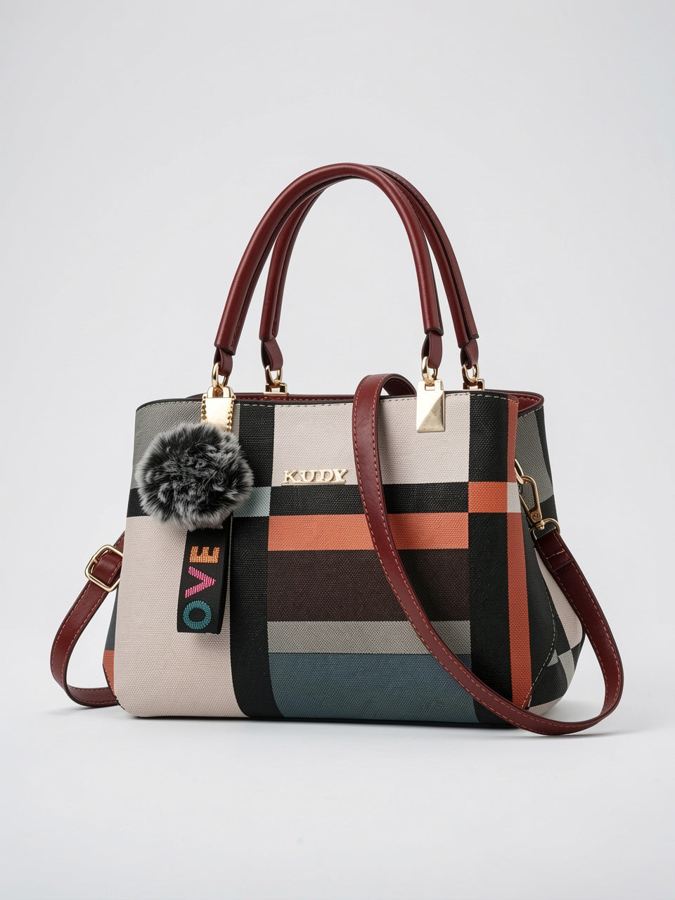 Odette — Sac à main à bandoulière avec son charms pompon - Café